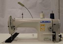 JUKI DDL-8700 High-Speed Single Needle Straight Lockstitch Industrial Sewing Machine With Table and Servo Motor